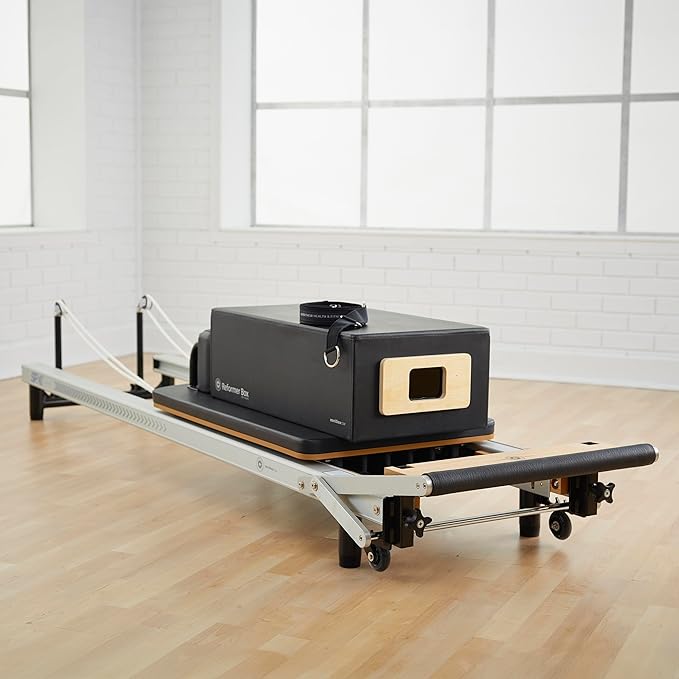 Merrithew™ at Home SPX® Reformer Package with Reformer Box, Footstrap, Padded Platform Extender and Metal Roll-up Pole – Pilates Workouts at Home