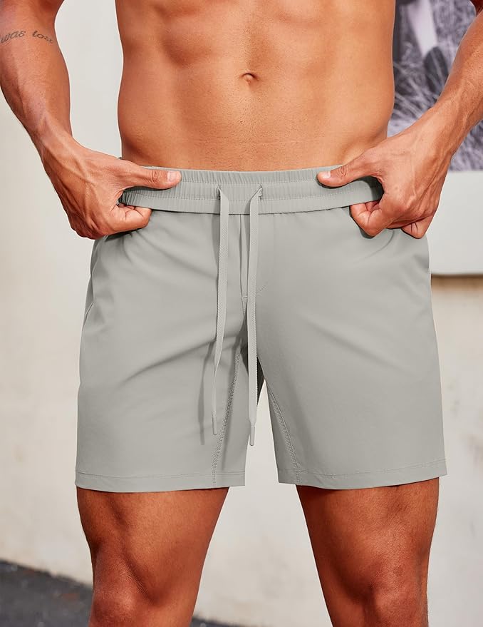 PINSPARK Men's Gym Workout Shorts - 7" Quick Dry Running Athletic Shorts with Towel Loop and Zipper Pockets