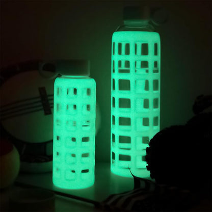 purifyou 40oz / 32oz / 22oz / 12oz Borosilicate Glass Water Bottle with Time & Volume Markers, Silicone Sleeve, Stainless Steel Lid | Reusable Glass Bottle for Water & Juice (22oz Glow-in-the-Dark)