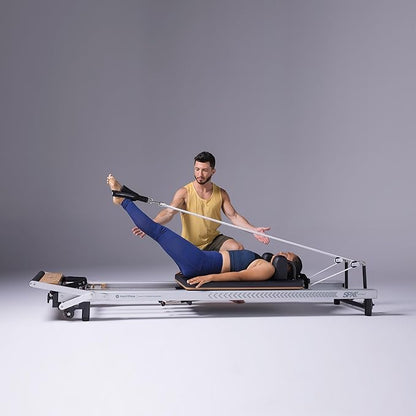 Merrithew™ at Home SPX® Reformer Package with Reformer Box, Footstrap, Padded Platform Extender and Metal Roll-up Pole – Pilates Workouts at Home