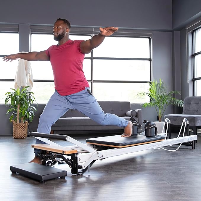Merrithew™ at Home SPX® Reformer Package with Reformer Box, Footstrap, Padded Platform Extender and Metal Roll-up Pole – Pilates Workouts at Home