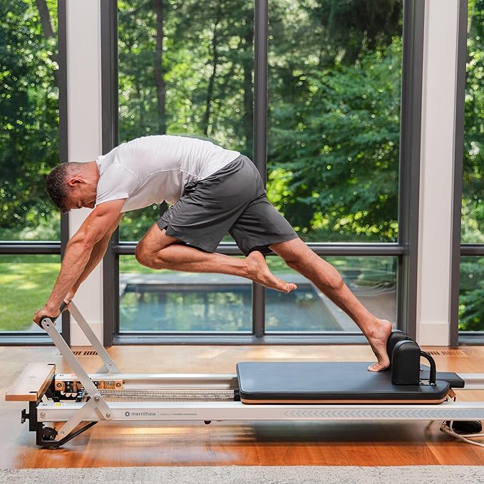 Merrithew™ at Home SPX® Reformer Package with Reformer Box, Footstrap, Padded Platform Extender and Metal Roll-up Pole – Pilates Workouts at Home