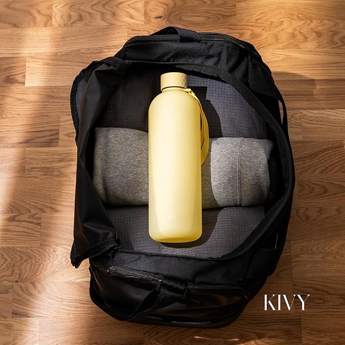 KIVY Large Water Bottle 50oz [Lightweight & Shatterproof] Fits Backpack & Cupholder for Travel, Sports, School - Extra large water bottle no straw - 1.5 Liter water bottles - 50oz Water bottle Yellow